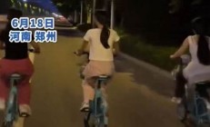 大學生夜騎到達開封找交警拍照合影(大學生騎車回家)